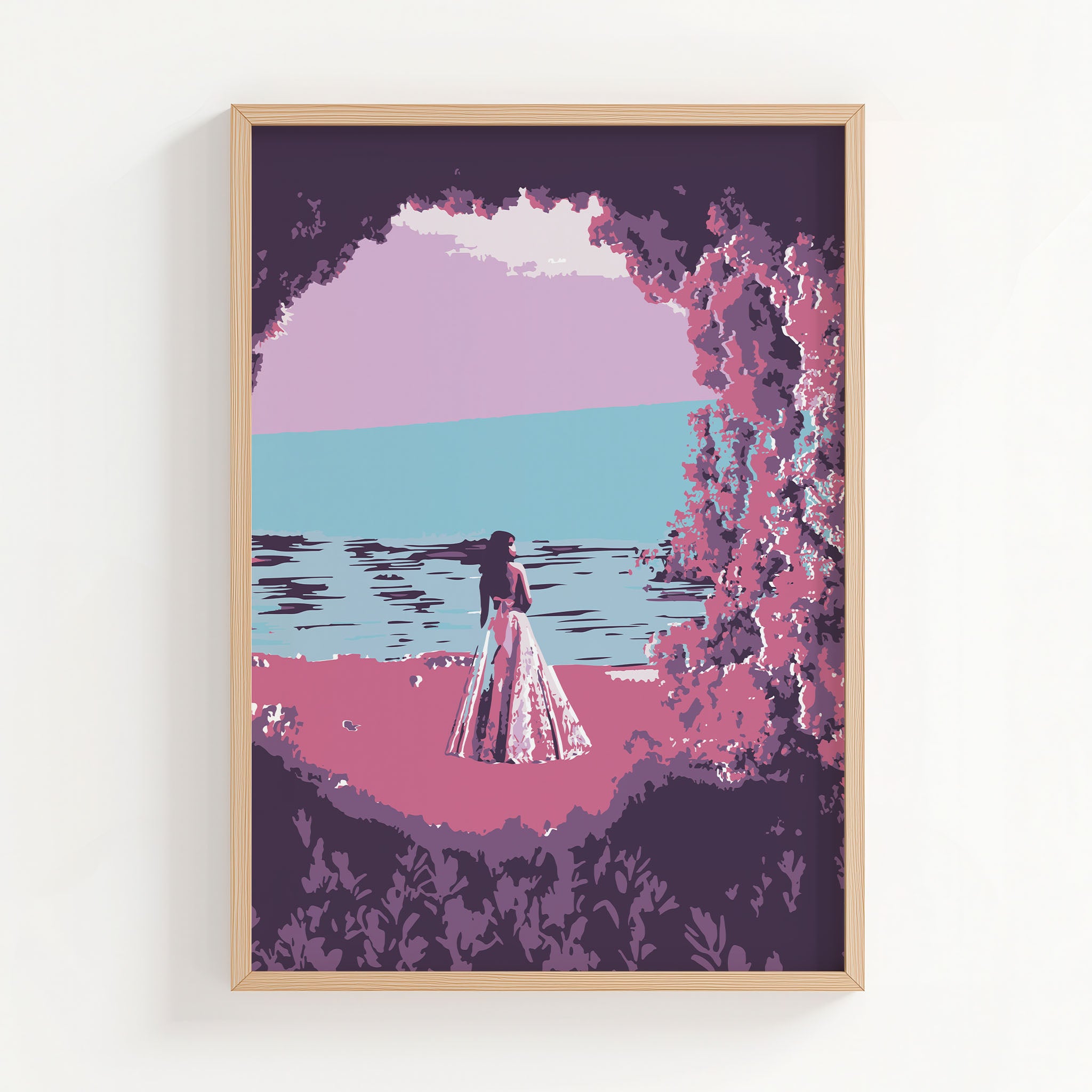 Dreamy beach wall art featuring a woman in a flowing dress standing by the ocean, framed by pink and purple foliage, with a calm sea and pastel sky creating a serene, romantic atmosphere