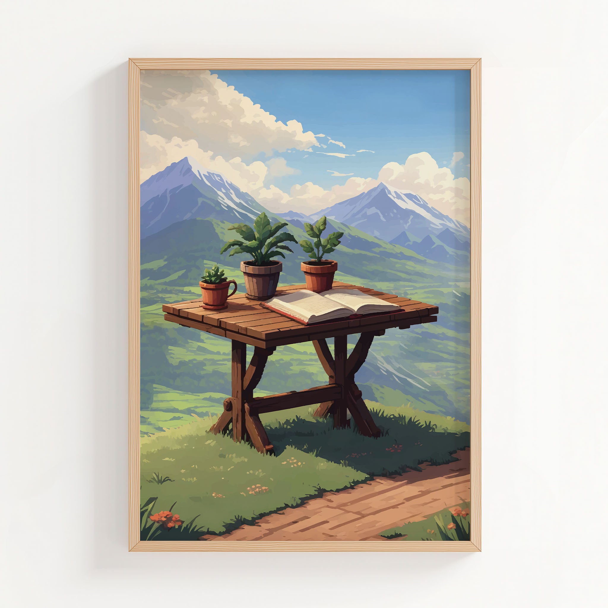 Scenic mountain view printable wall art featuring a rustic wooden table with potted plants and an open book, set against a breathtaking backdrop of lush green valleys and snow-capped peaks under a bright blue sky