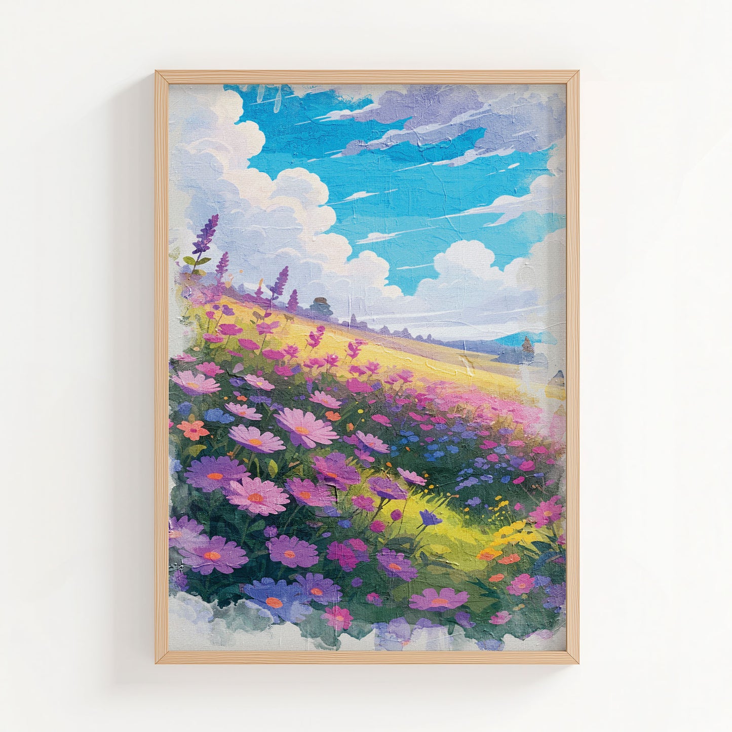 Vibrant printable wall art of a dreamy wildflower field in full bloom, featuring purple, pink, and blue blossoms under a bright blue sky with fluffy clouds, evoking warmth, joy, and a touch of whimsy
