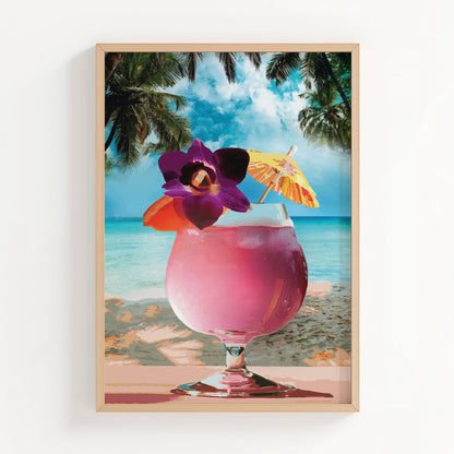 Tropical cocktail wall art print featuring a vibrant pink drink with a purple orchid, orange slice, and paper umbrella, set against a serene beach and palm tree backdrop, perfect for summer vibes and beach-themed decor