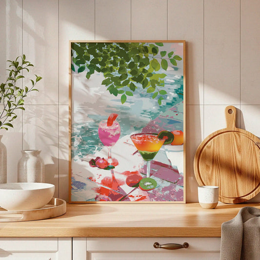 Vibrant tropical cocktail art print featuring colorful drinks with fruit garnishes, set by the water under lush green leaves, ideal for summer decor or beach-inspired kitchens
