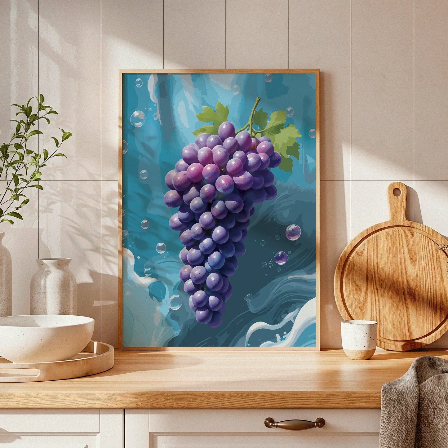Printable wall art featuring a vibrant bunch of purple grapes with green leaves against a refreshing blue water-inspired background with bubbles, perfect for kitchen, dining room, or wine-themed decor.