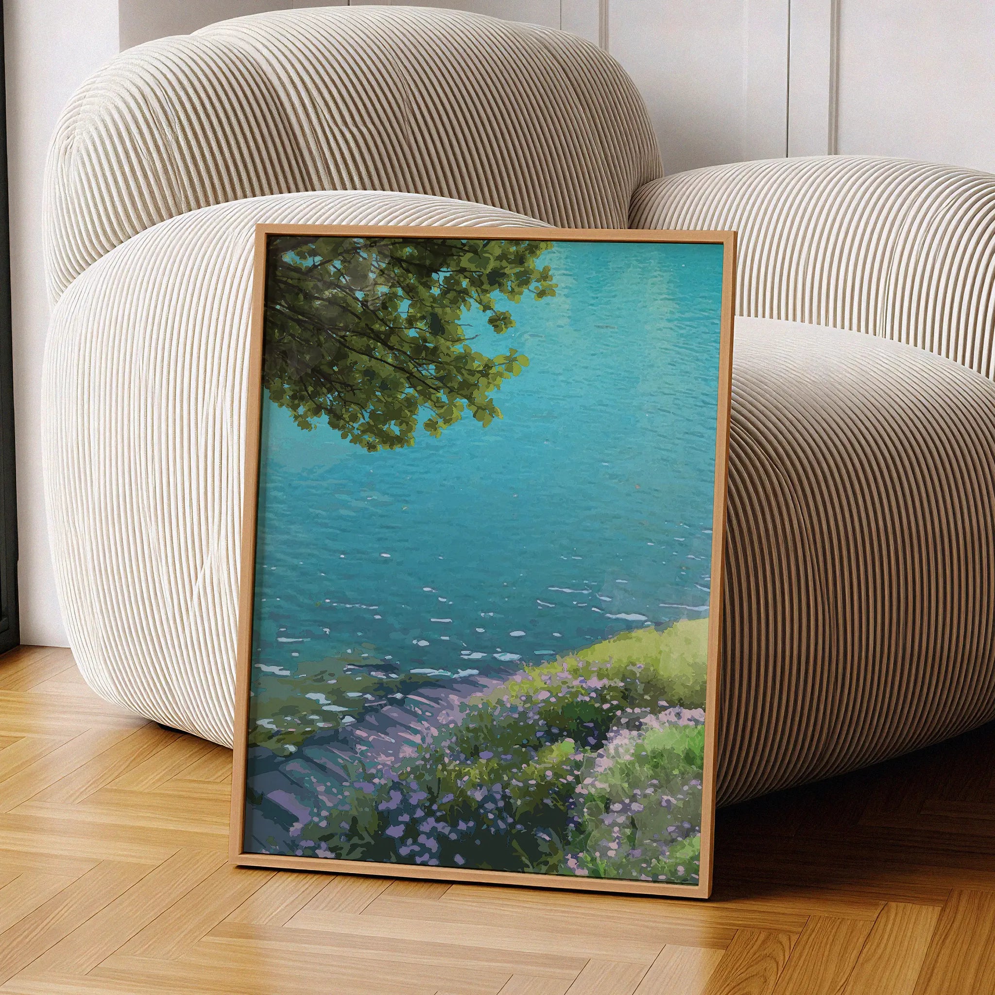 Tranquil lakeside wall art featuring crystal-clear turquoise water, a small wooden dock, and a flower-covered grassy bank under the shade of leafy tree branches