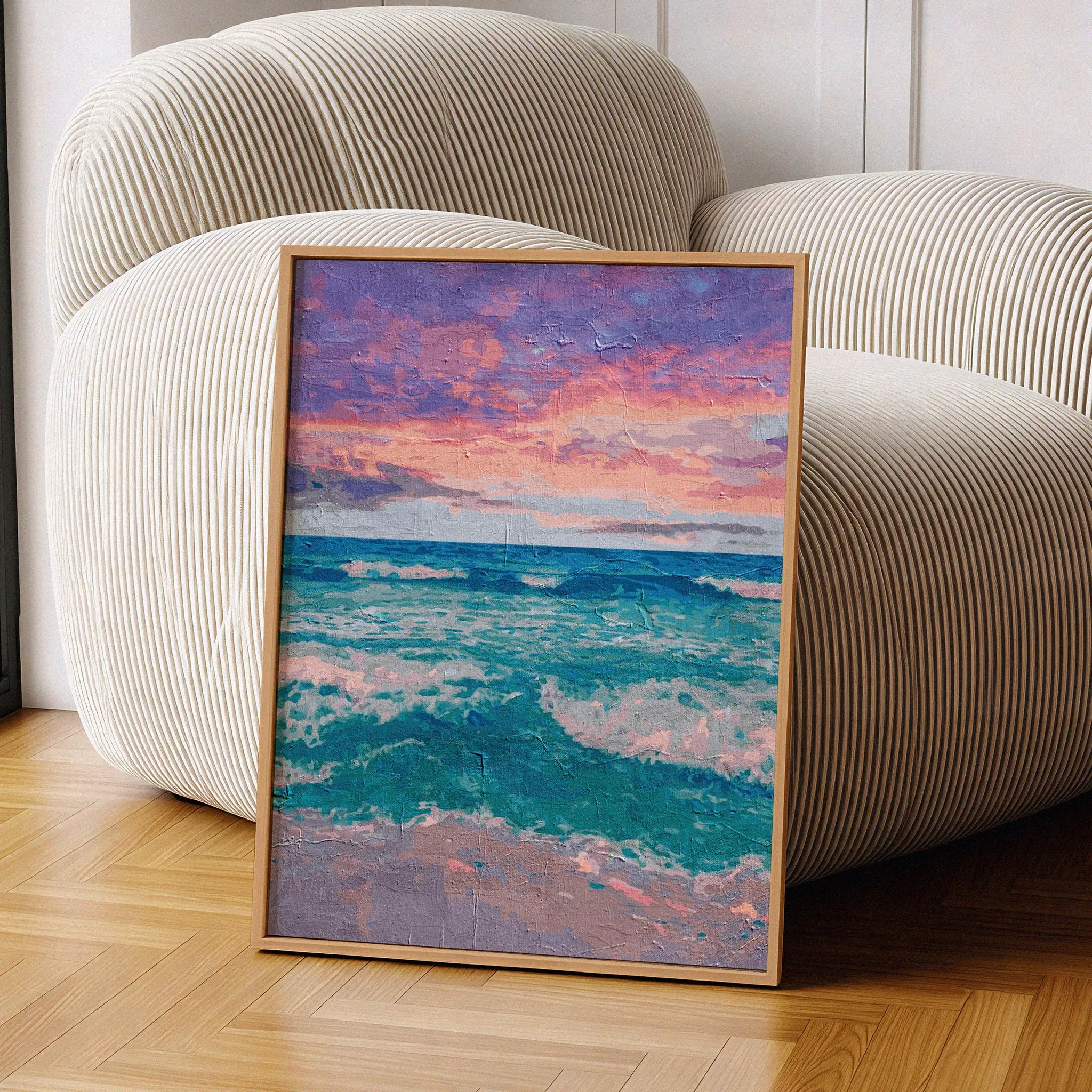 Peaceful ocean wall art featuring gentle turquoise waves rolling onto the shore beneath a vibrant pink and purple sunset sky, with a soft textured painterly effect