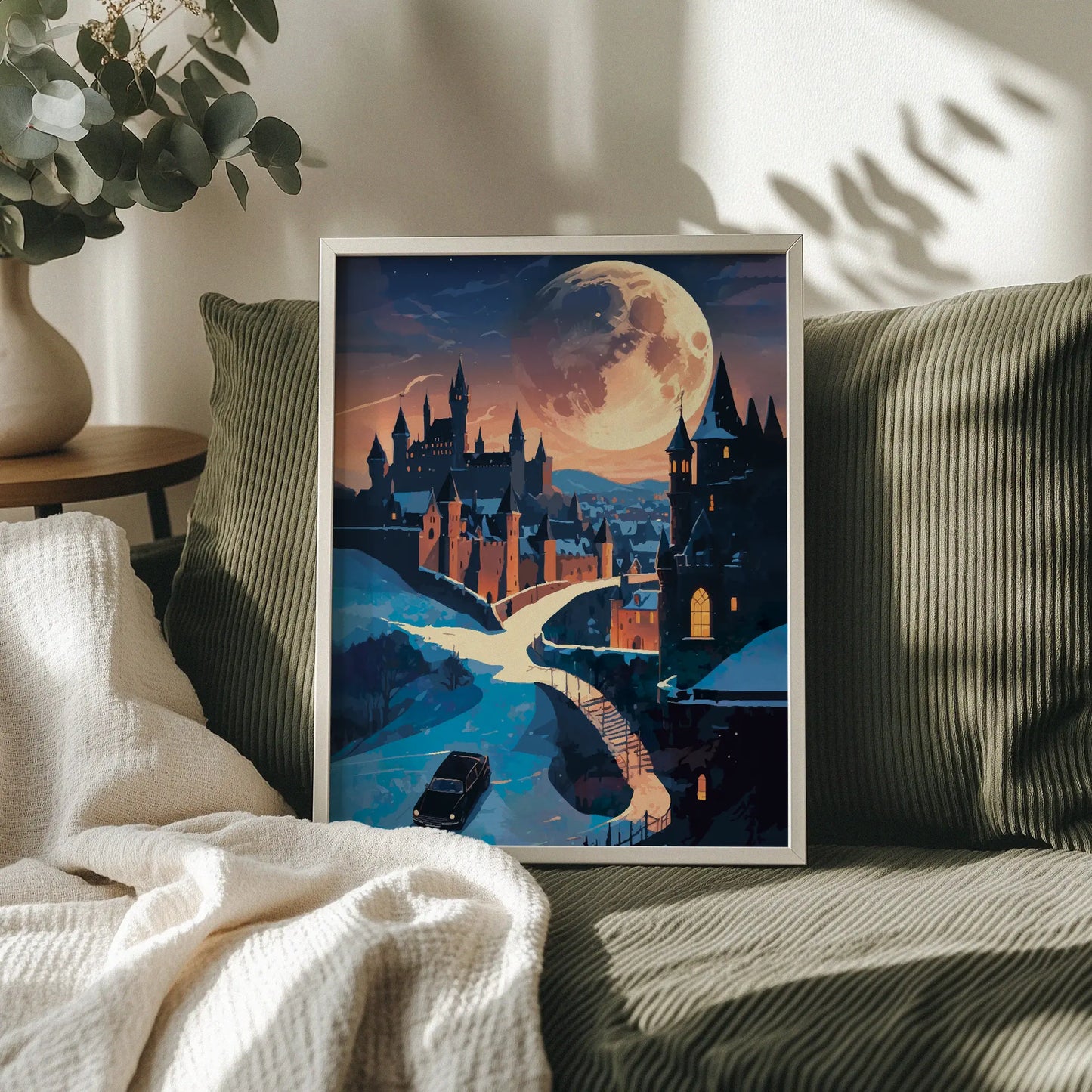 Magical night scene featuring a grand castle illuminated under a massive glowing full moon. A winding road and bridge lead to the castle gates as a car approaches through the snowy landscape, creating a mysterious and enchanting fantasy atmosphere.