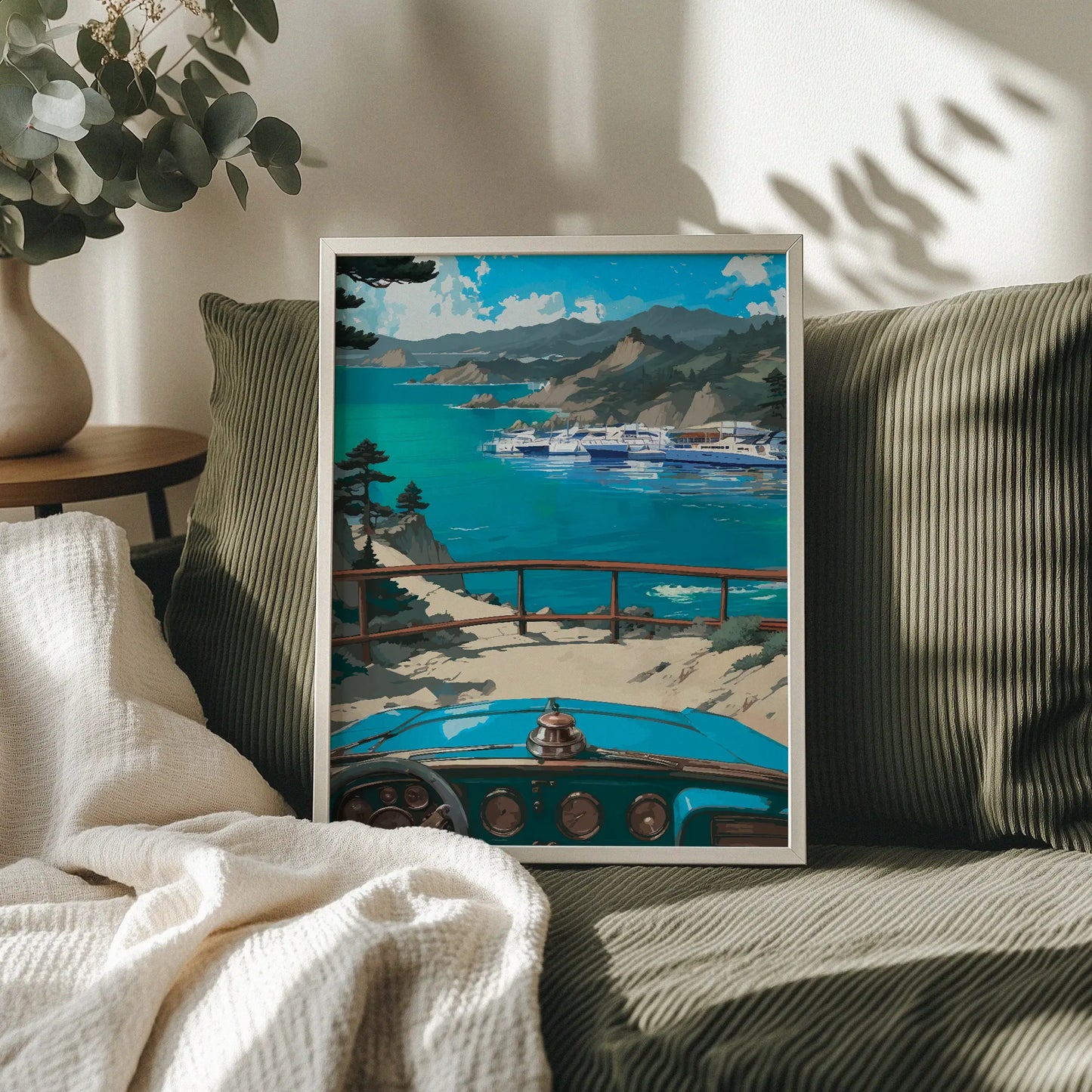Scenic coastal-themed printable wall art featuring a vintage blue car overlooking a marina filled with yachts, with dramatic cliffs, turquoise waters, and distant mountains under a vivid blue sky, perfect for travel lovers, beach house decor, or retro-inspired interiors