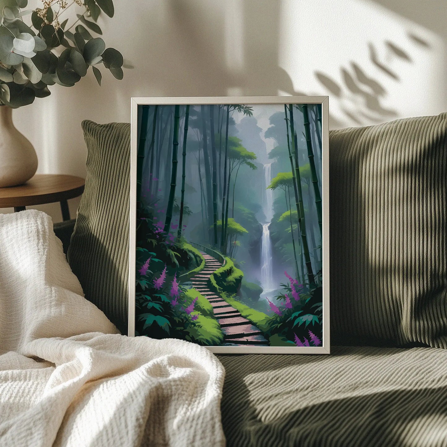 Scenic wall art of a misty bamboo forest with a winding path leading to a tall waterfall surrounded by lush greenery and purple flowers