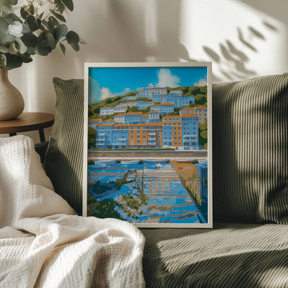 Coastal cityscape wall art showcasing colorful hillside buildings in shades of blue and orange, reflected in a calm waterfront marina with small boats and a bright blue sky overhead