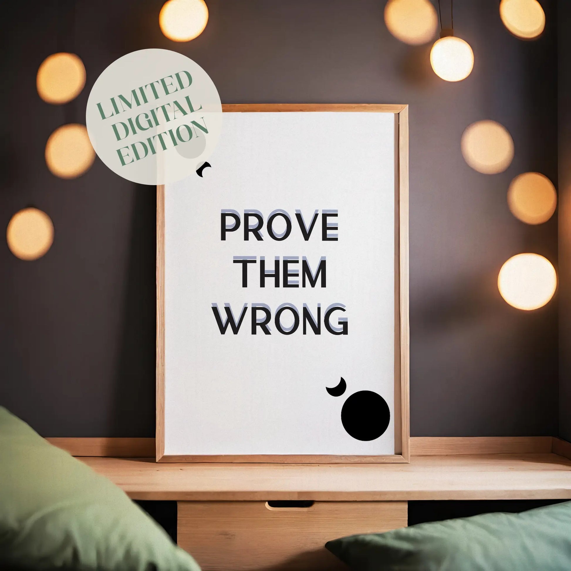 Minimalist motivational printable wall art with the bold quote 'Prove Them Wrong' in modern black gradient typography, accented by abstract black circles and crescent shapes on a clean white background, ideal for office, gym, or study space inspiration