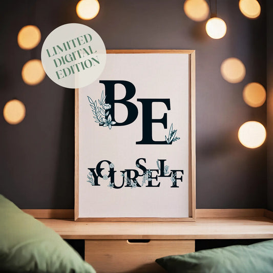 Aesthetic floral-themed printable wall art featuring the motivational phrase 'Be Yourself' in bold black serif typography decorated with delicate botanical illustrations, set against a soft beige background with natural light - ideal for bedroom, dorm, or creative space decor