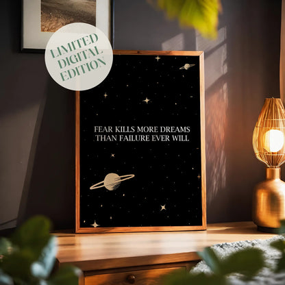 Inspirational printable wall art featuring the quote 'Fear kills more dreams than failure ever will' in elegant white serif font, set against a black starry background with minimalist gold planets and stars – perfect for office or home decor