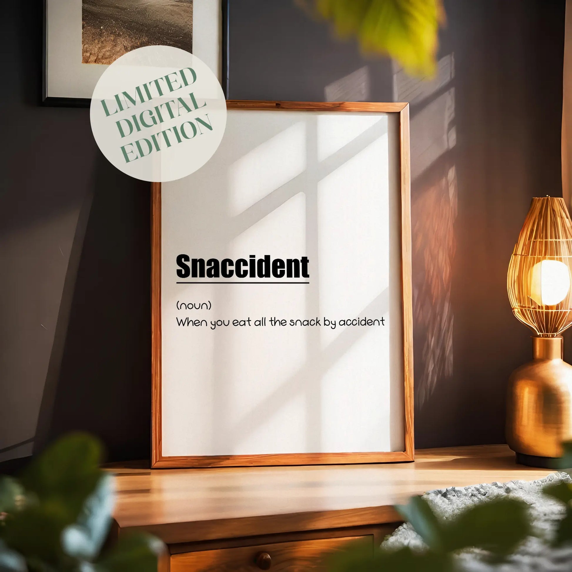 Funny printable wall art with the humorous definition 'Snaccident (noun): When you eat all the snack by accident' in playful black typography on a clean white background - perfect for kitchens, dining areas, or gift decor for food lovers
