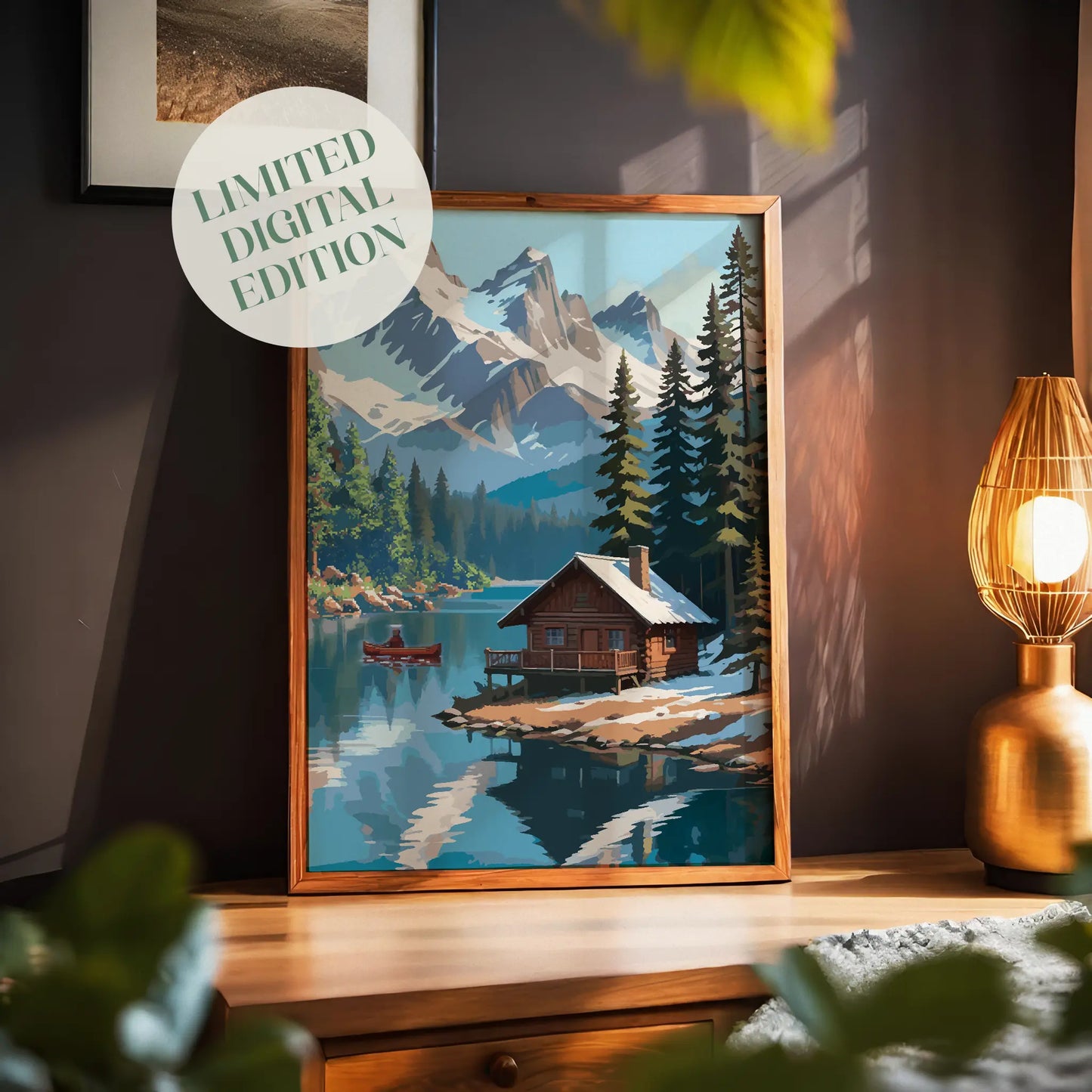 Rustic winter cabin printable wall art featuring a cozy log cabin on the edge of a tranquil lake, surrounded by snow-dusted pine trees and dramatic snow-covered mountain peaks, with a red canoe gliding across the water, perfect for cabin, adventure, or nature-inspired decor