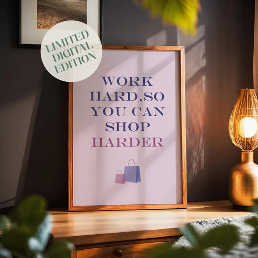 Chic and motivational printable wall art featuring the quote 'Work hard, so you can shop harder' in bold purple and pink gradient typography, with shopping bag illustrations on a soft pink background – perfect for fashion lovers, boutique decor, or glam office spaces