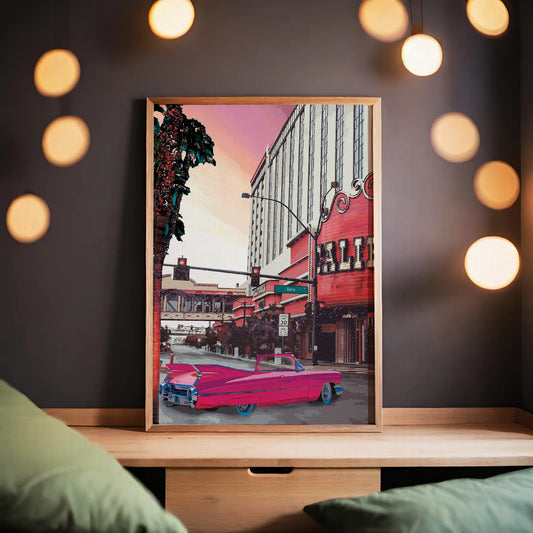 Printable wall art of a retro city street scene with a bright pink vintage convertible car, palm trees, and a classic theater marquee under a pastel sunset sky, perfect for nostalgic, urban-inspired home decor