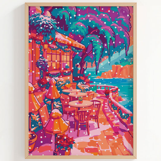 Kitchen or dining room wall art showing a snowy seaside café terrace with umbrellas, small tables, and ocean views.