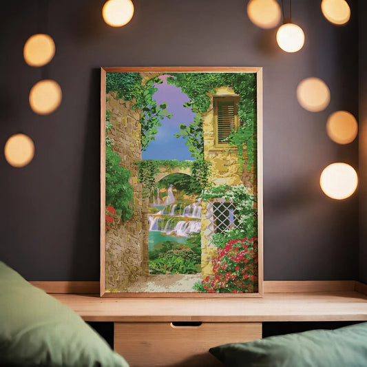 Charming printable wall art of a Mediterranean alleyway framed by ivy-covered stone buildings, with a view of cascading waterfalls and a stone bridge under a vibrant purple-blue sky, perfect for bringing a touch of European romance to your space