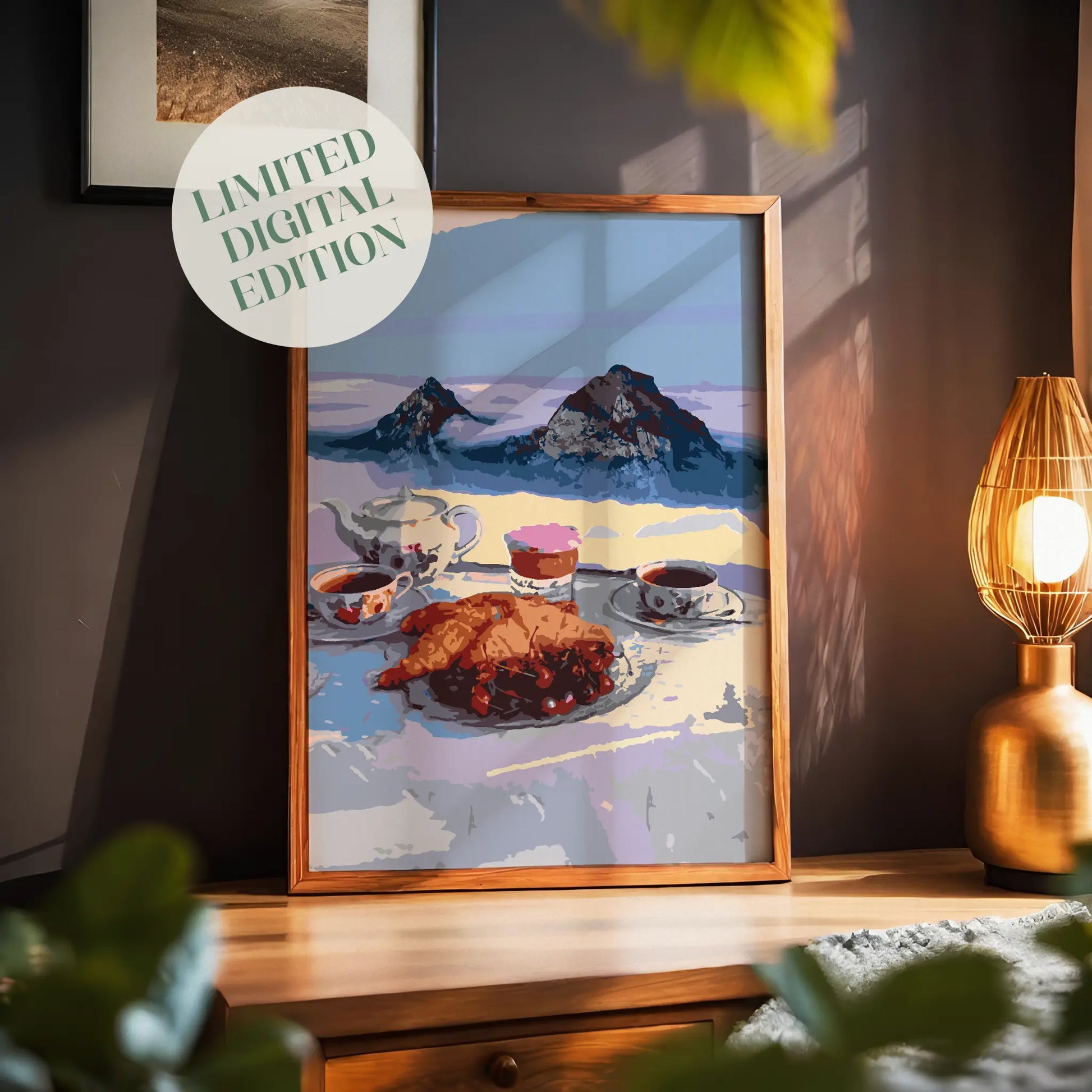 Cozy printable wall art of a serene alpine breakfast scene featuring croissants, tea, and coffee with a majestic mountain backdrop, perfect for kitchen or café-inspired decor