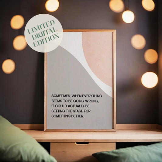Modern motivational printable wall art featuring the quote 'Sometimes, when everything seems to be going wrong, it could actually be setting the stage for something better' in black text over abstract curved shapes in soft beige and peach tones, perfect for uplifting and calming interior spaces