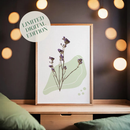 Modern minimalist wall art featuring delicate dried purple flowers arranged over a soft abstract green shape with subtle shadows and clean white background, perfect for a calm and natural interior aesthetic