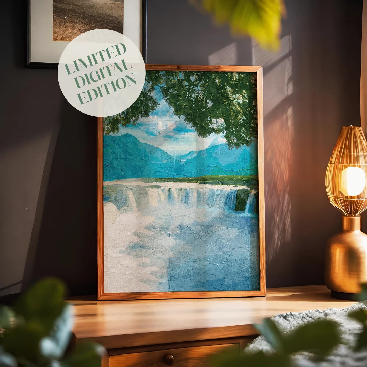 Tranquil waterfall wall art featuring a wide, gentle cascade framed by leafy tree branches, with distant blue mountains and a peaceful sky creating a calming nature scene